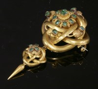 Lot 42 - A Victorian foiled emerald knot brooch