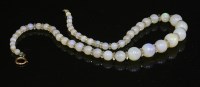 Lot 66 - A Victorian single row graduated opal and rock crystal rondelle bead necklace