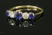 Lot 176 - A five stone graduated sapphire and diamond ring