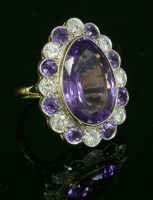 Lot 199 - An amethyst and diamond cluster ring