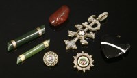 Lot 1563 - Two gold mounted nephrite bar brooches