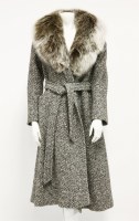 Lot 1321 - An Aquascutum wool tweed mid-length coat with fox fur collar