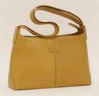 Lot 1121 - A Tod's classic tan leather shoulder handbag
