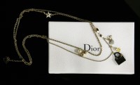 Lot 1604 - A Christian Dior two-row gold-plated chain necklace