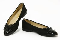 Lot 1425 - A pair of Chanel black patent and textured leather ballet pump shoes