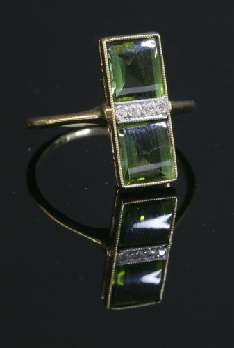 Lot 159 - A gold Art Deco two stone tourmaline and diamond fingerline ring