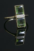 Lot 159 - A gold Art Deco two stone tourmaline and diamond fingerline ring