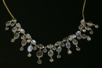 Lot 115 - An Edwardian gold moonstone fringe necklace
