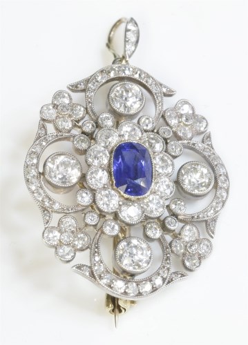 Lot 49 - A late Victorian sapphire and diamond lobed cluster brooch/pendant
