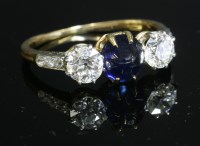 Lot 153 - A three stone sapphire and diamond ring