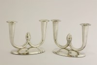 Lot 522 - A pair of silver candlesticks