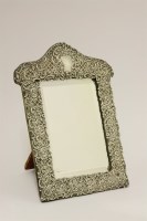 Lot 523 - A Victorian silver-mounted mirror