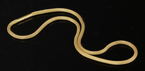 Lot 258 - A gold tubular mesh link necklace