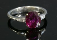 Lot 315 - A gold single stone ruby ring