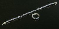 Lot 337 - A Continental white gold and sapphire line bracelet and ring suite