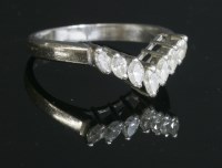 Lot 334 - A diamond set half wishbone ring