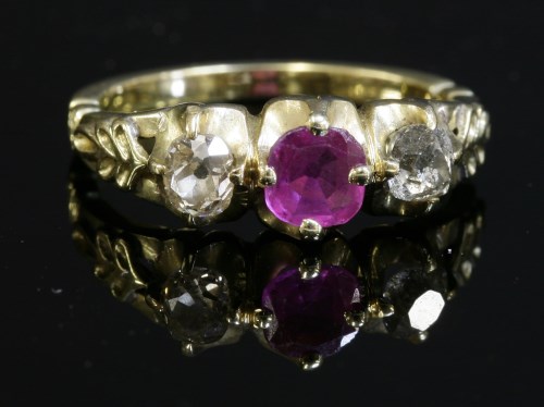 Lot 59 - A Victorian three stone pink sapphire and diamond ring