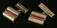 Lot 180 - A pair of rose gold synthetic ruby cufflinks