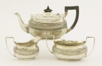 Lot 433 - A matched George V silver three-piece tea service