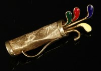 Lot 273 - An 18ct gold golf bag and clubs brooch