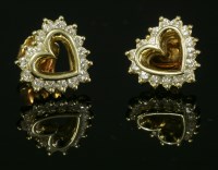 Lot 296 - A pair of gold diamond set heart-shaped stud earrings
