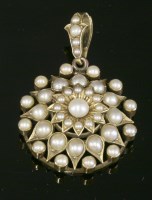 Lot 83 - A Victorian split pearl cluster pendant