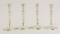 Lot 452 - Two matched pairs of Victorian and Edwardian silver candlesticks