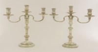 Lot 449 - A pair of Elizabeth II silver three-light candelabra
