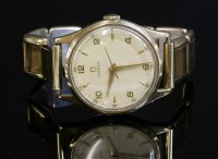 Lot 377 - A gentlemen's 9ct gold Omega mechanical strap watch