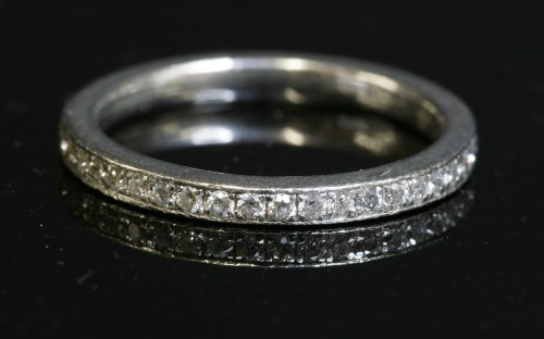 Lot 328 - A platinum diamond set half eternity ring