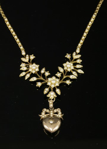 Lot 84 - A late Victorian gold and split pearl necklace