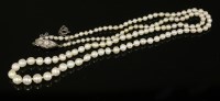 Lot 143 - A single row graduated natural pearl necklace