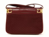 Lot 1080 - A Gucci vintage red leather and canvas shoulder handbag