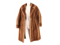 Lot 1379 - A three-quarter length palomino mink coat
