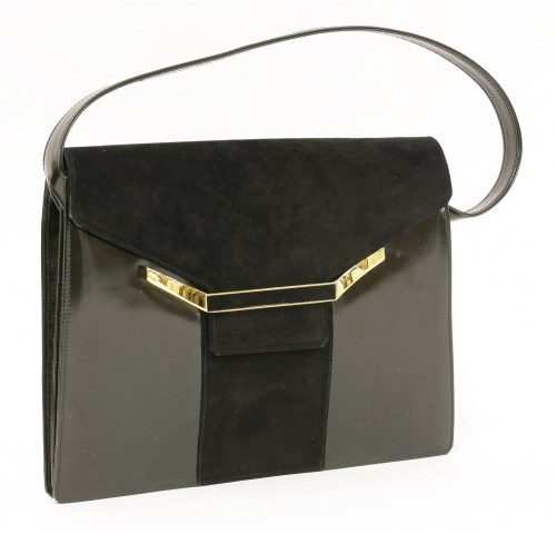Lot 1007 - A Christian Dior black leather clutch bag