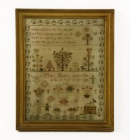 Lot 1205 - An early George III embroidered sampler