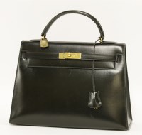 Lot 1014 - An Hermès 32 black box calf leather 'Kelly' handbag