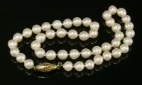 Lot 220 - A single row uniform cultured pearl necklace