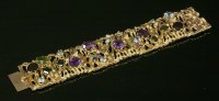 Lot 233 - An assorted gemstone set gold bracelet