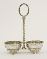 Lot 468 - A Victorian silver two-bottle stand
