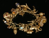 Lot 208 - An Italian gold figure of eight charm bracelet