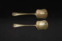 Lot 506 - A pair of George III silver-gilt ice cream spoons