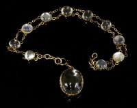 Lot 116 - A gold moonstone bracelet
