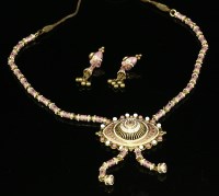 Lot 252 - An Indian high carat gold and enamel necklace and earrings suite