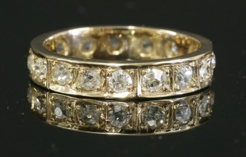 Lot 161 - A rose gold full eternity ring