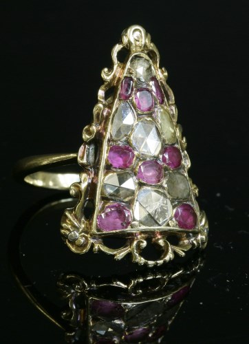 Lot 17 - A ruby and diamond cluster ring