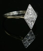 Lot 166 - An Art Deco diamond set lozenge-shaped cluster ring