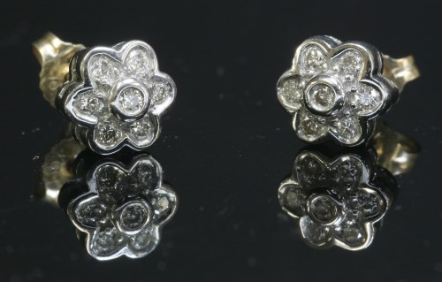 Lot 330 - A pair of 9ct gold diamond set cluster earrings