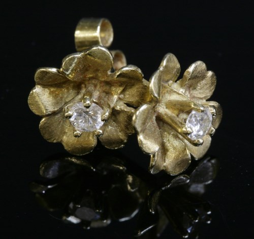 Lot 289 - A pair of 18ct gold single stone diamond stud earrings