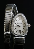 Lot 305 - A ladies' stainless steel Bulgari diamond set 'Serpenti Tubogas' quartz bracelet watch